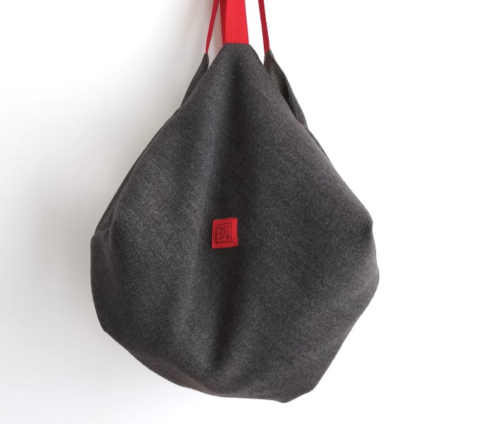 Origami llaneta gris i tires vermelles web