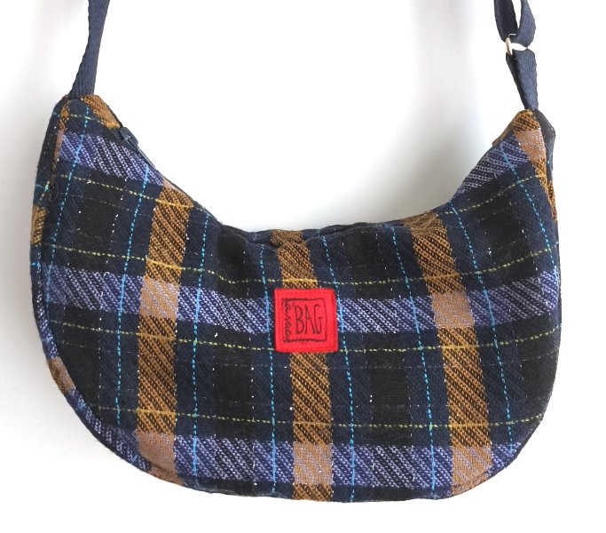 brinco quadres blaus i mostassa i línia purpurina