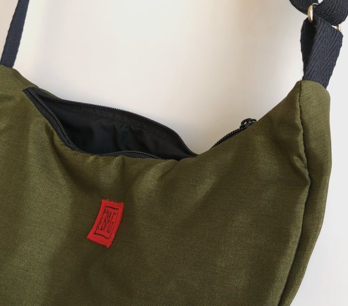 detall brinco verd impermeable