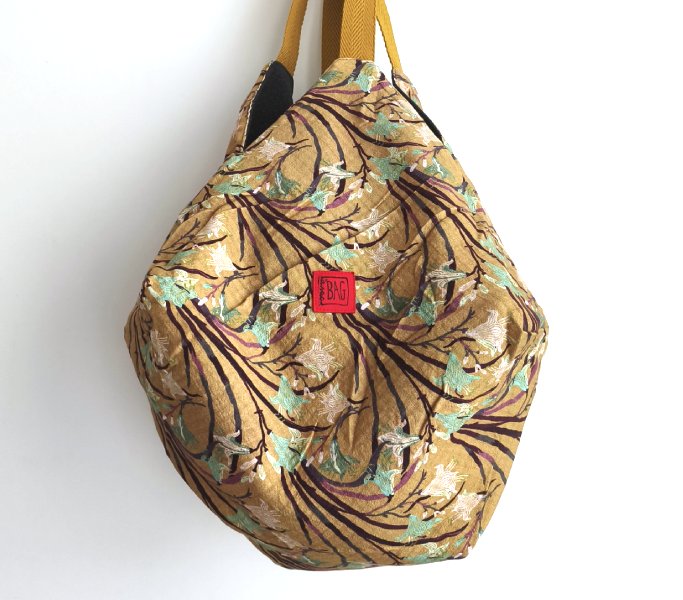 origami ocre floral i llaneta gris web