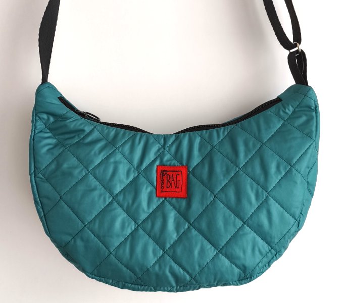 Brinco teixit encoixinat turquesa
