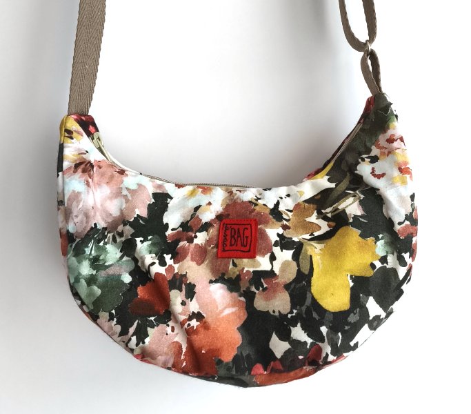 Brinco teixit floral